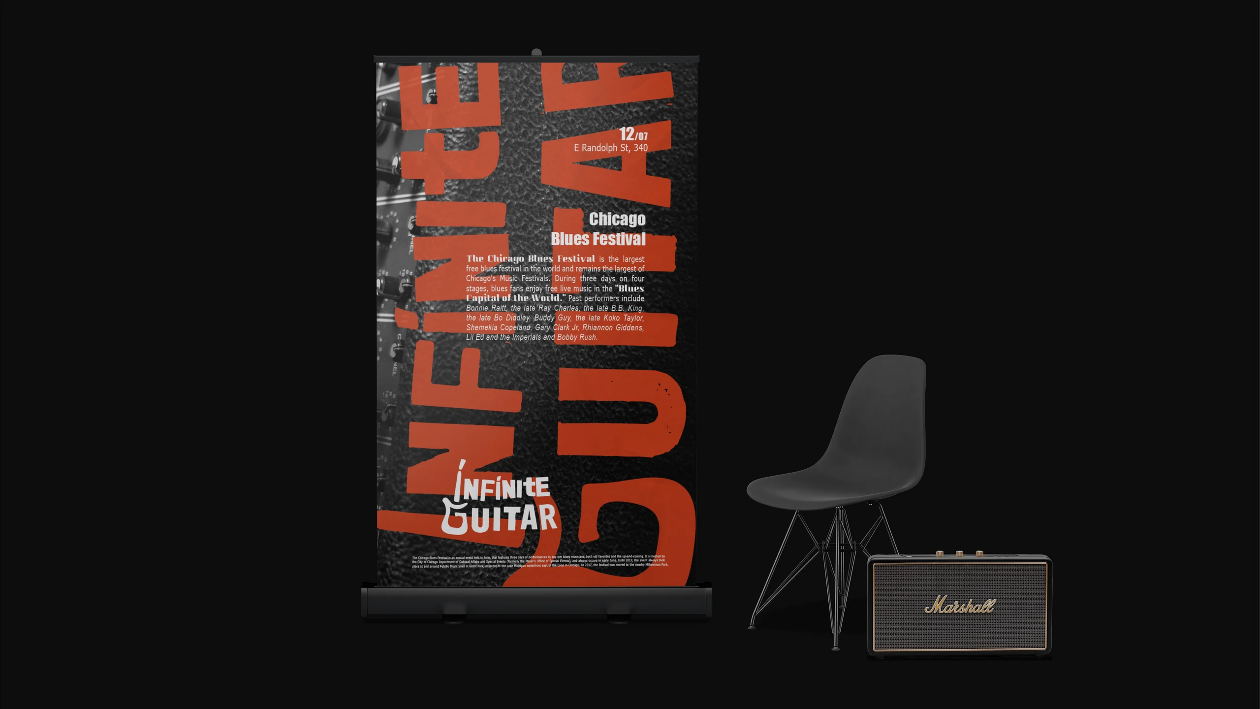 Ролл-ап Infinite Guitar рядом с креслом и гитарным усилителем