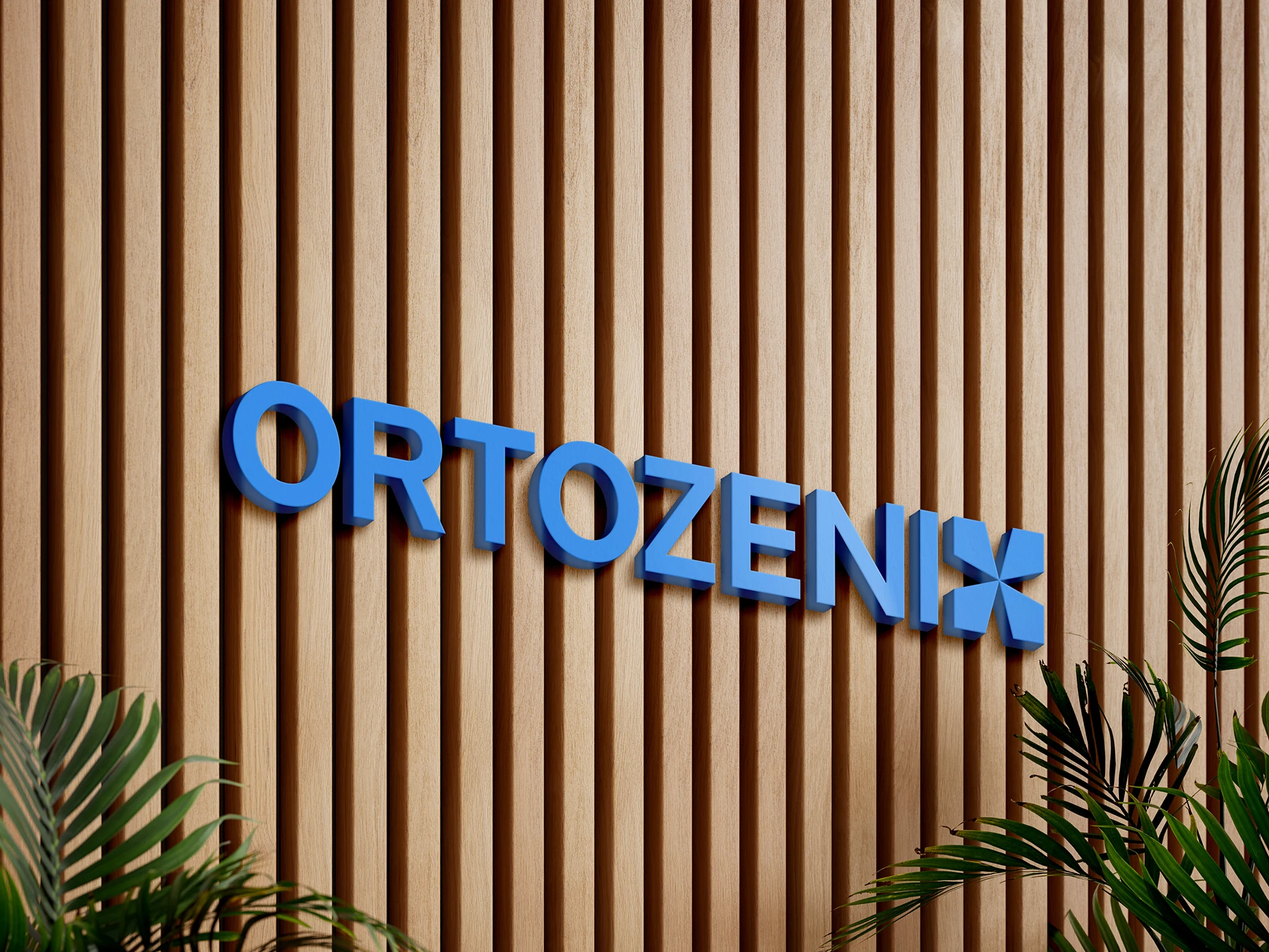Логотип ORTOZENIX на стене интерьера
